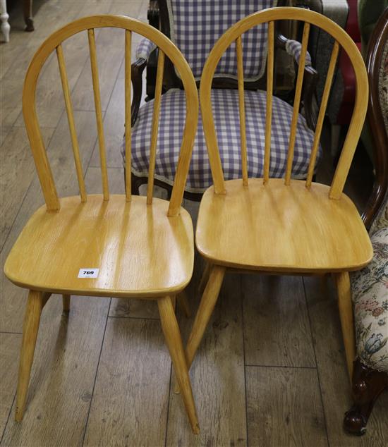 A pair of Ercol windsor chairs